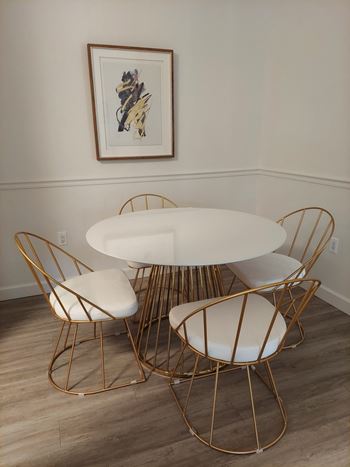 Table, Chairs and Vinyl Flooring at Mainstreet Apartments, Clearwater, FL 33756