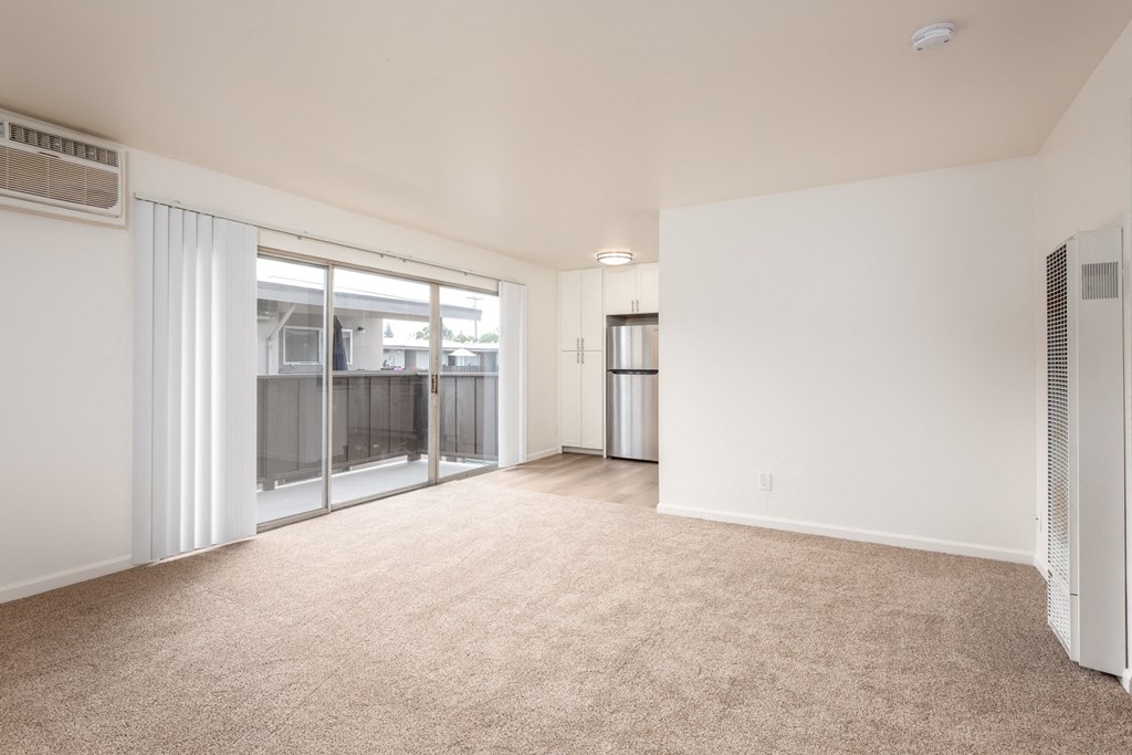 Living Room of an Upstairs 2 BRM Apartment with Upgraded Amenities