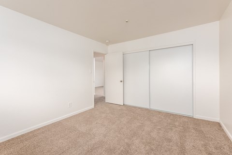 Primary Bedroom of an Upstairs 2 BRM Apartment