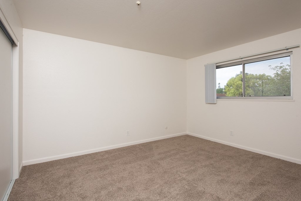 Primary Bedroom of an Upstairs 2 BRM Apartment