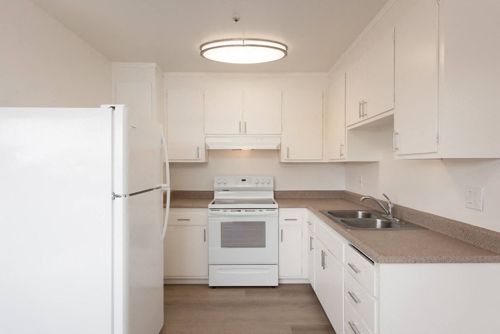 Kitchen of an Upstairs 1 BRM Apartment with Original Amenities