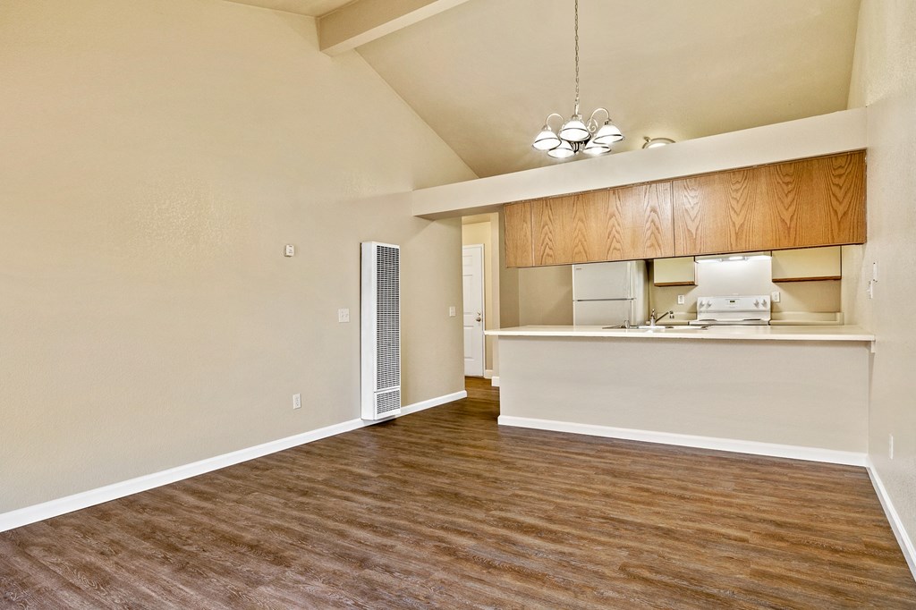 Living Room of an Upstairs Apartment with Original Amenities