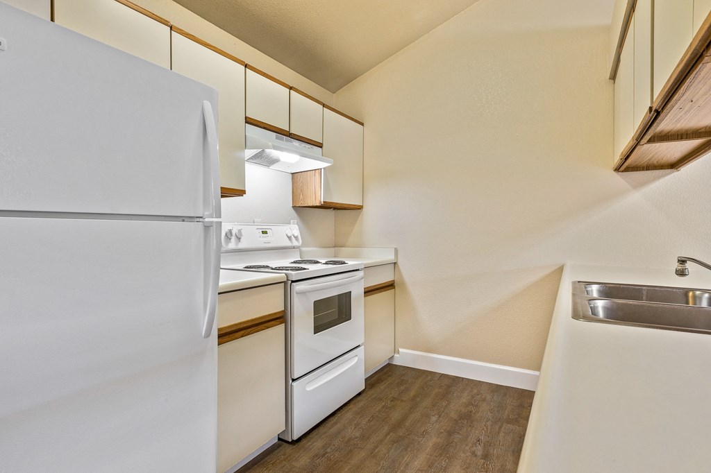 Kitchen of an Upstairs Apartment with Original Amenities