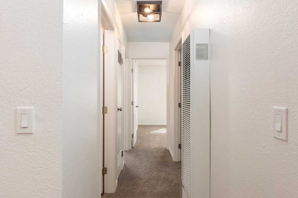 Hallway of an Upstairs Apartment with Upgraded Amenities