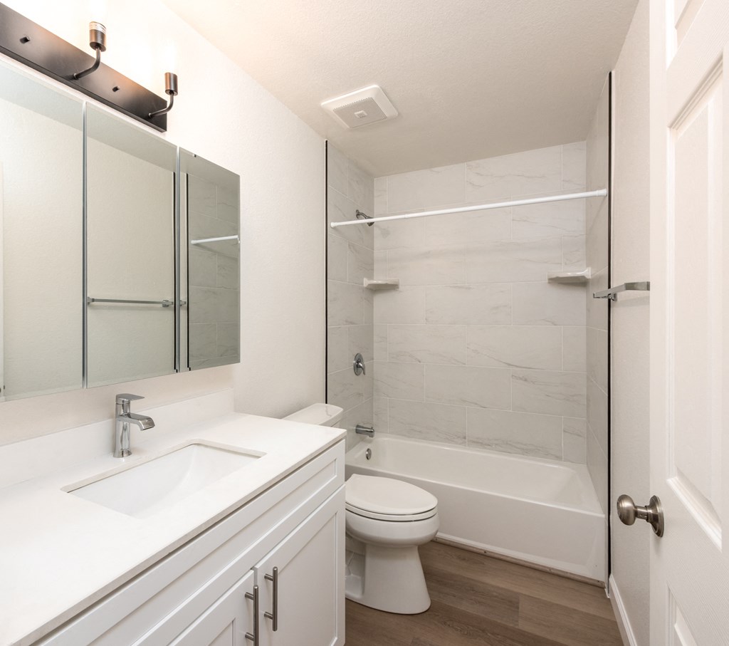 Bathroom of an Upstairs Apartment with Upgraded Amenities