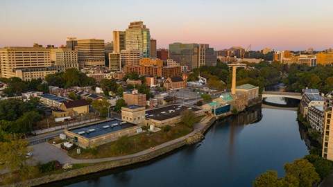 a view of the city from above the river