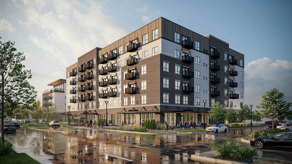 a rendering of an apartment building on a rainy day