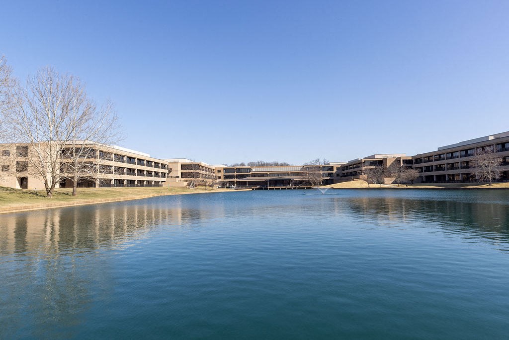 a large body of water in front of a building at The Residences at Tesson Ridge, Saint Louis, 63128