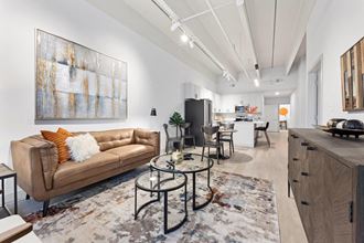 a living room with a couch and a table