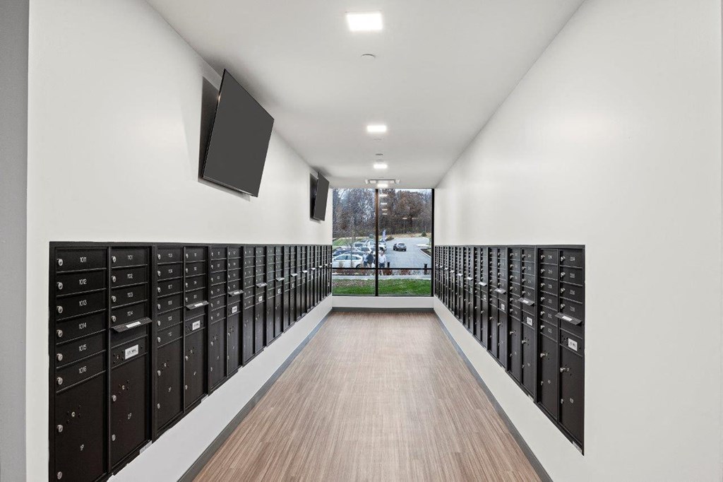 a building with a bunch of lockers in it at The Residences at Tesson Ridge, Saint Louis, 63128