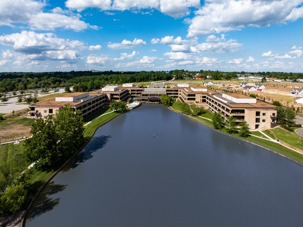 A large body of water is surrounded by buildings.