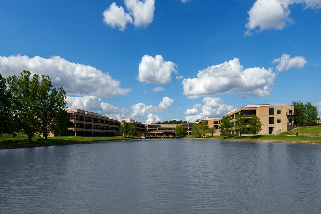 a view of a lake in front of a building