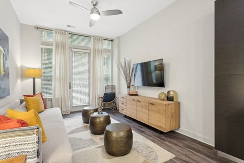 a living room with a couch and a tv