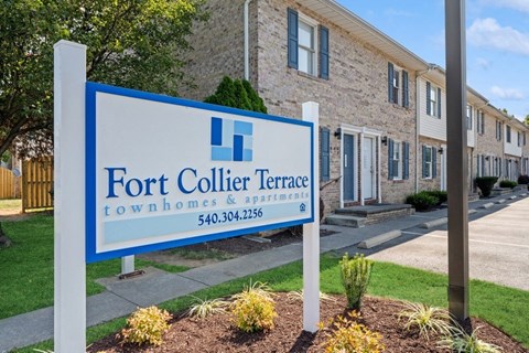 a sign that says fort collier terrace townhomes and apartments at Fort Collier Terrace, Winchester, VA