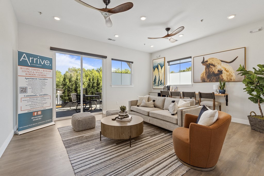 an open living room with a couch and a coffee table