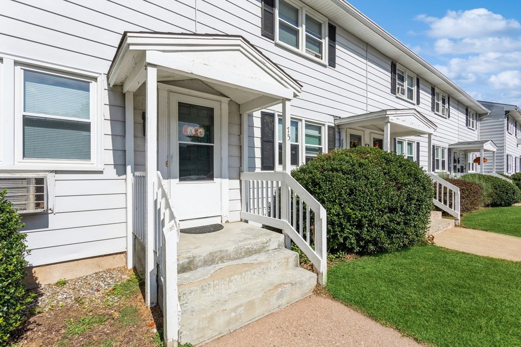 the front of a white house with a porch at Fox Hill Commons, Vernon, CT, 06066