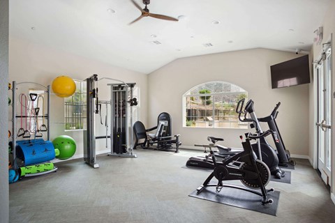 gym in the clubhouse at villas at houston levee west apartments in cordova, at Rancho Belago, Moreno Valley, CA, 92555