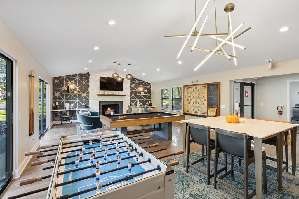 interior club room with foosball table at Ascent at Farmington Hills, Farmington Hills, 48331
