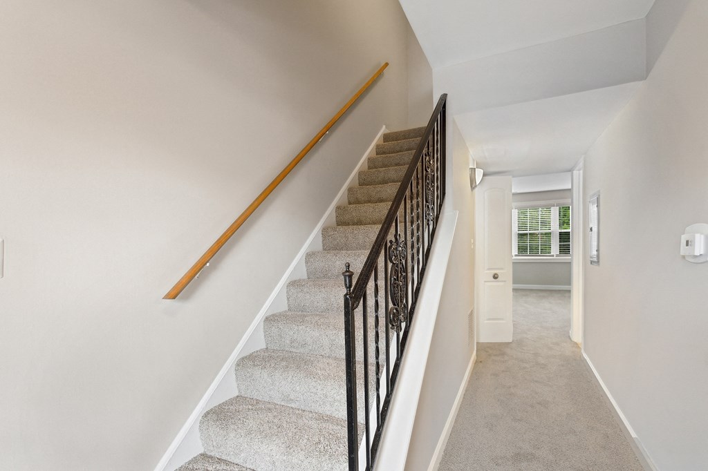 a flight of stairs leading to the first floor at The Hinsdale, Hinsdale, 60521