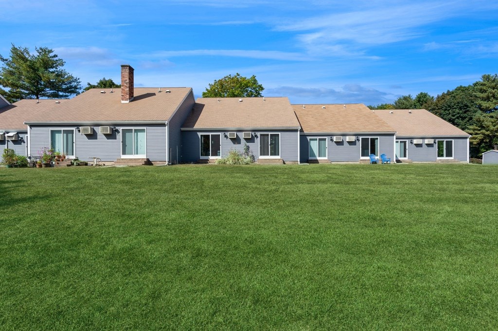 Exterior view of our apartments and landscaping in front at Arbor Commons