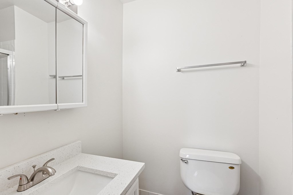 Bathroom with a sink and mirror