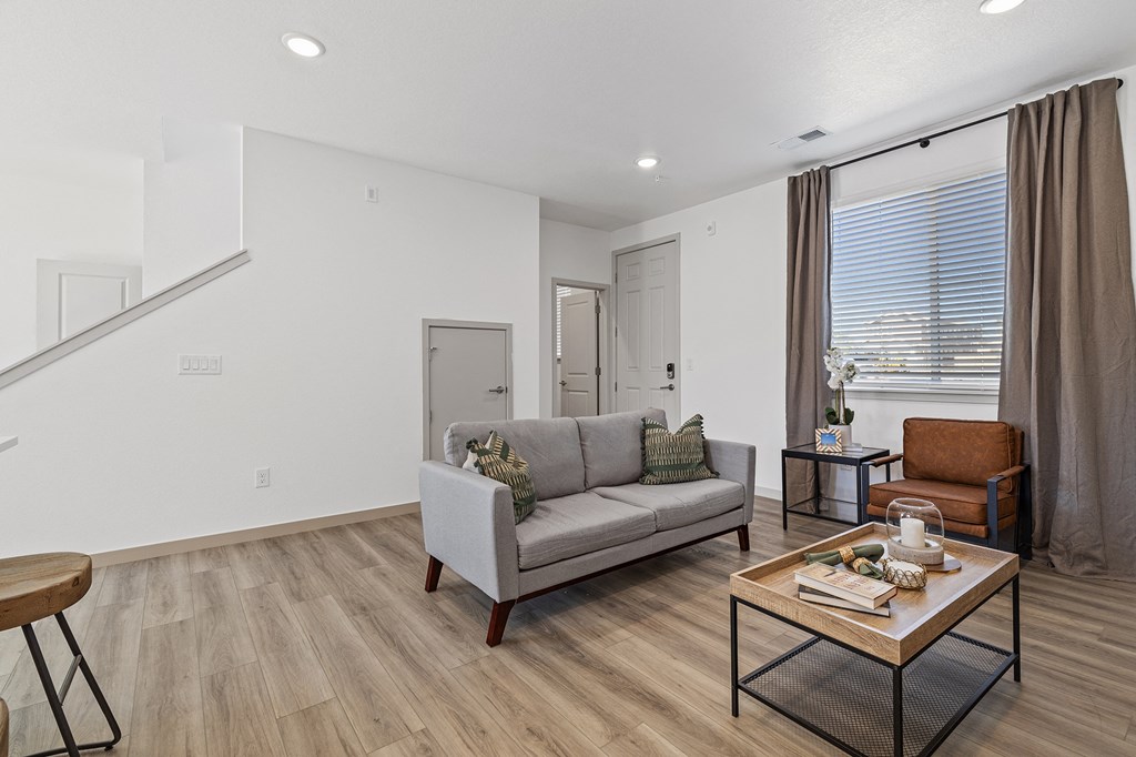 a living room with a couch and a coffee table