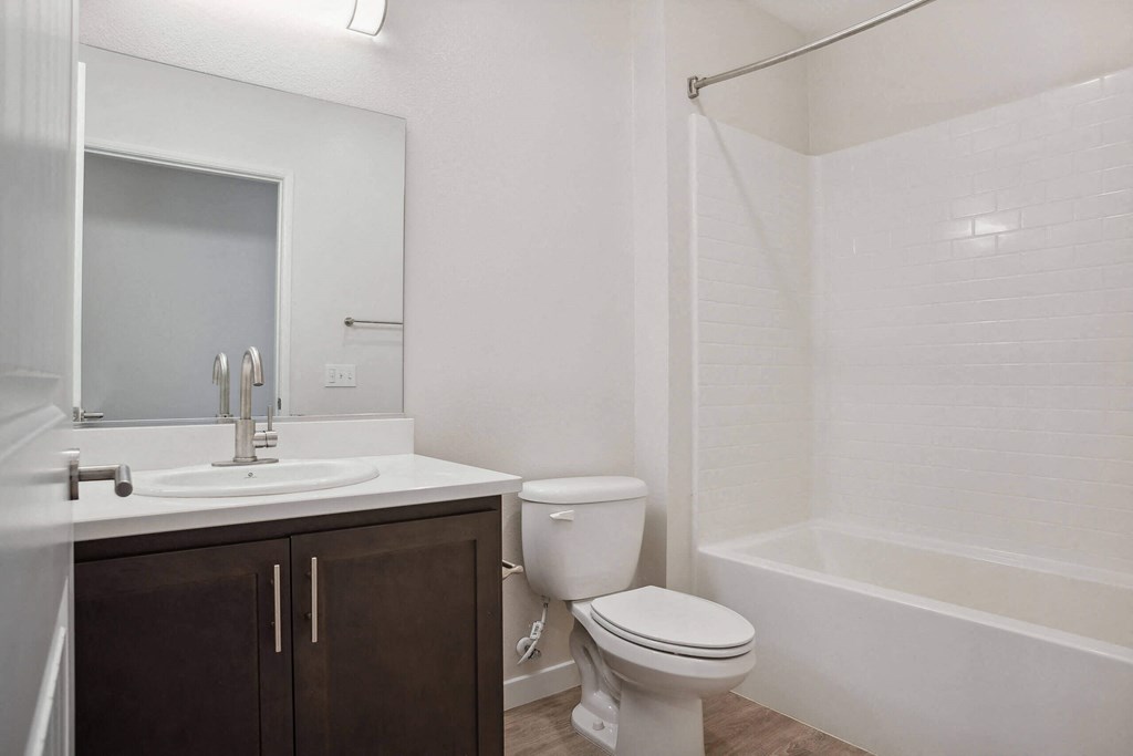 a bathroom with a sink toilet and bathtub at Arrive at Rancho Belago, California