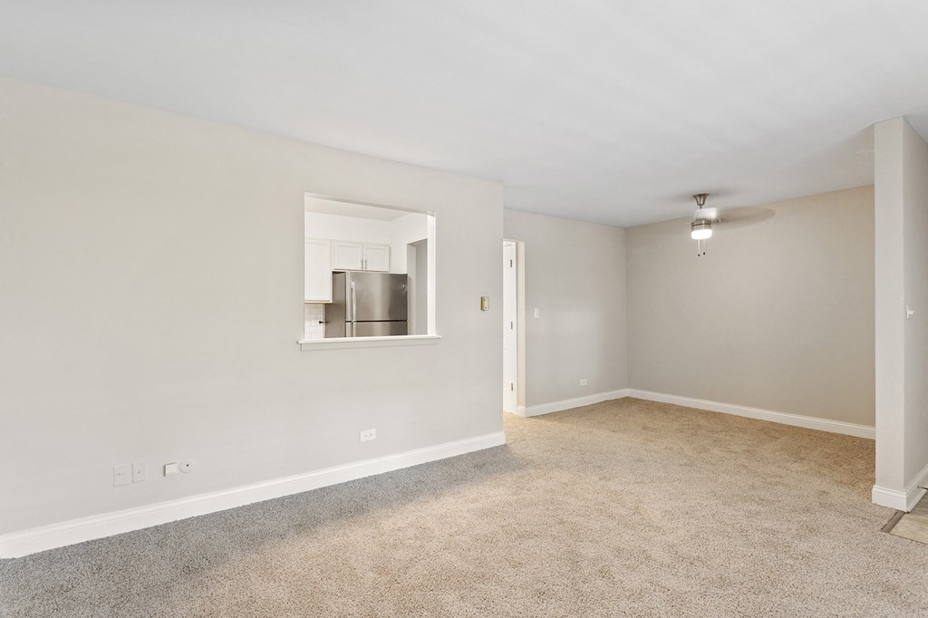 a bedroom with a large window at The Hinsdale, Hinsdale