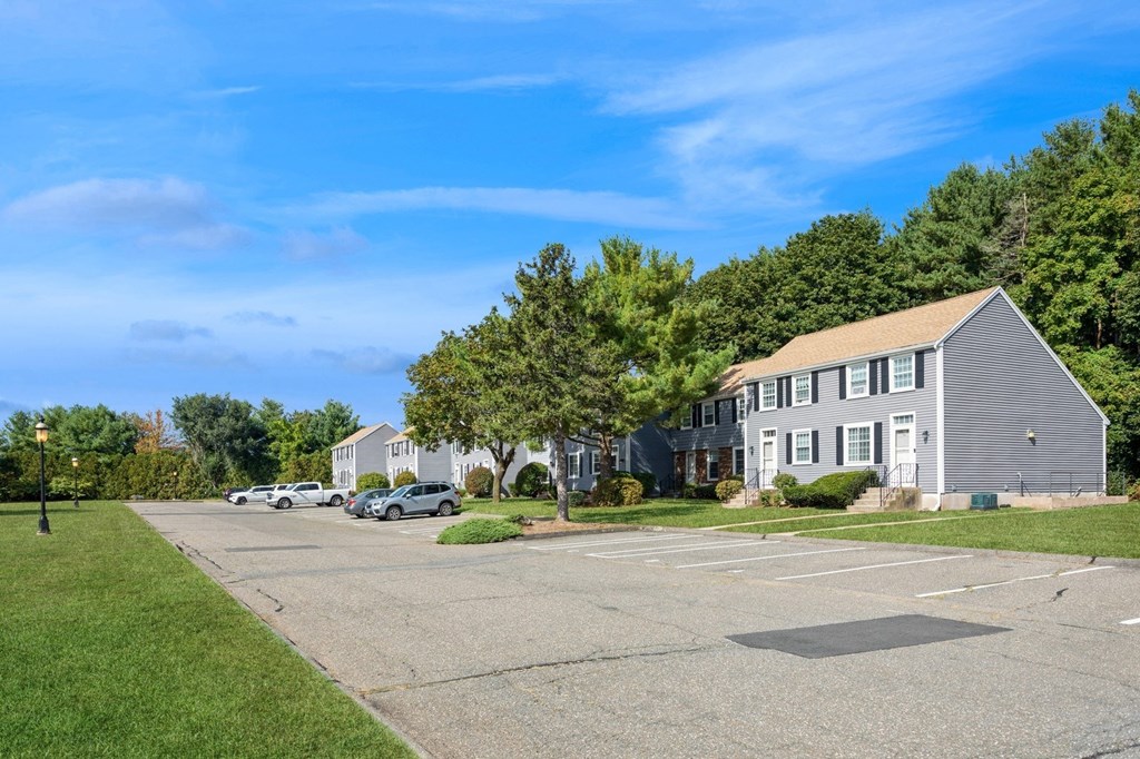 A parking lot in from of the apartments at Arbor Commons