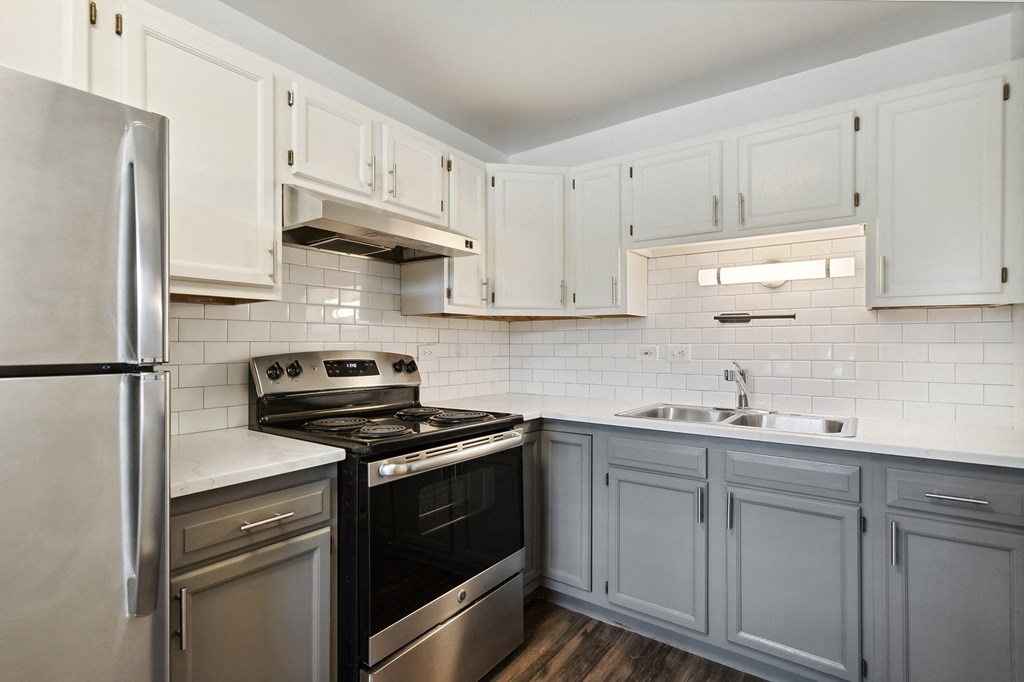 a kitchen with stainless steel appliances at The Hinsdale, Hinsdale, Illinois