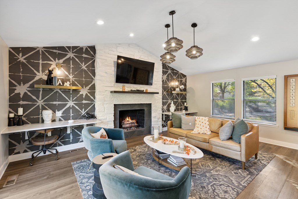 interior club room with sitting area and fireplace  at Ascent at Farmington Hills, Farmington Hills, MI