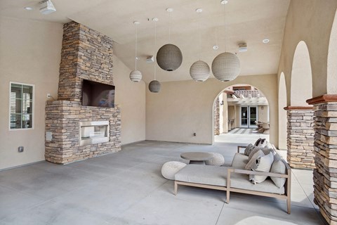 a living room with a couch and a fireplace