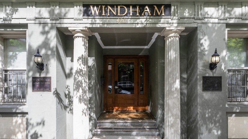 the entrance to the building of the windsor court hotel