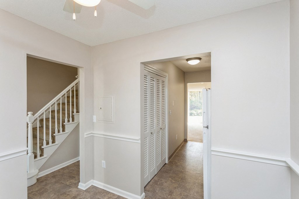 doorway view into the stair and kitchen