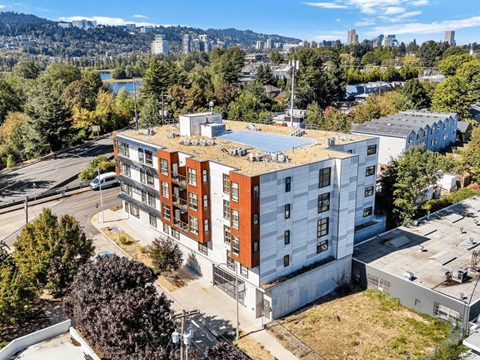 Aerial view of contemporary mixed use building at Brooklyn Yard Apartments, Oregon