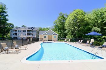our resort style swimming pool is next to our building and our apartment building at Mallory Ridge, Bloomfield, Connecticut