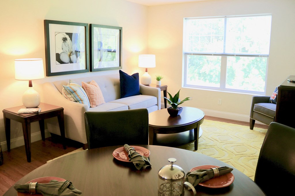 a living room with a couch and a table