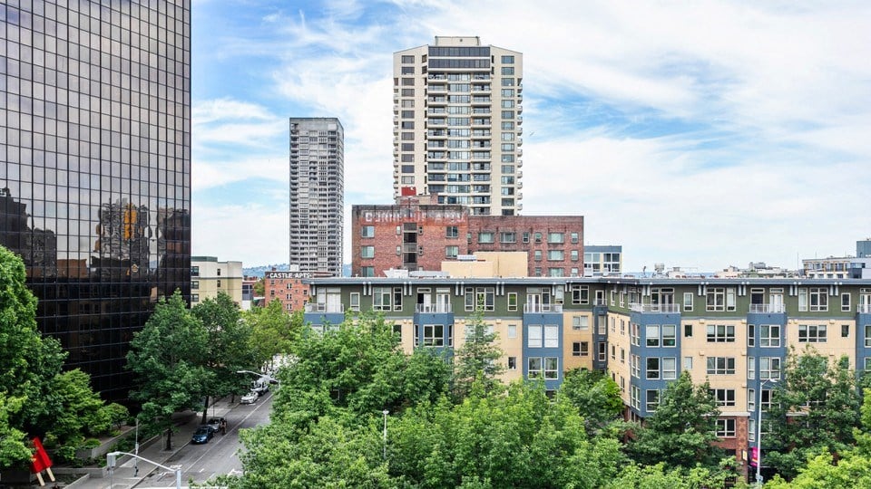 a view of the city from the roof of a building
