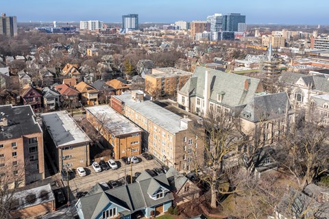 A cityscape with buildings and trees in the foreground at Pleasant Oak Apartments, Oak Park, 60302