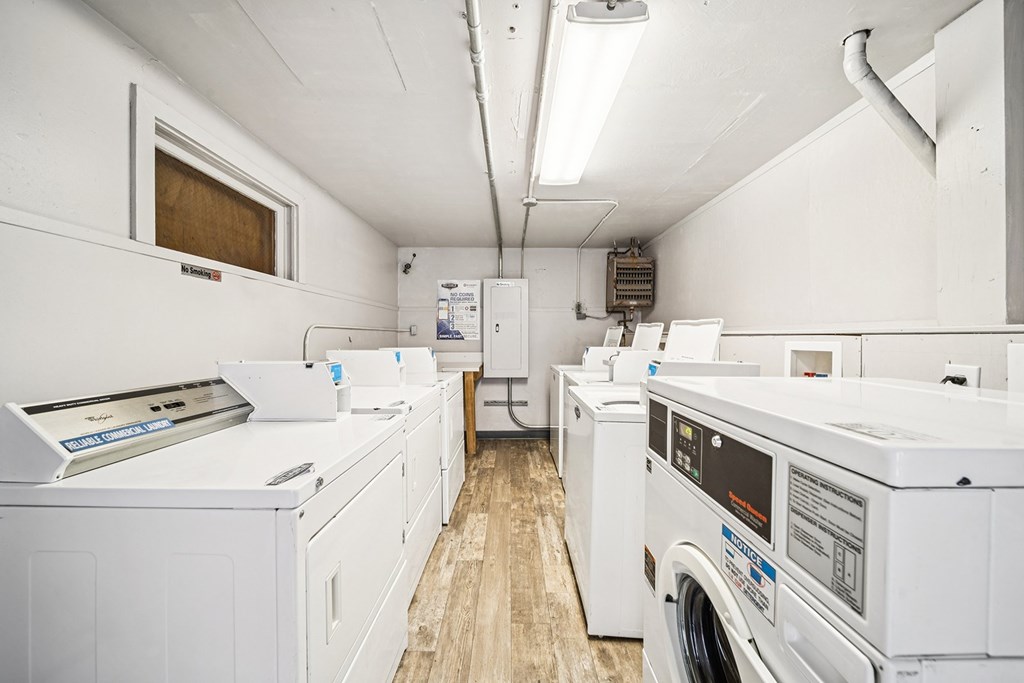 A laundry room with a washer and dryer.