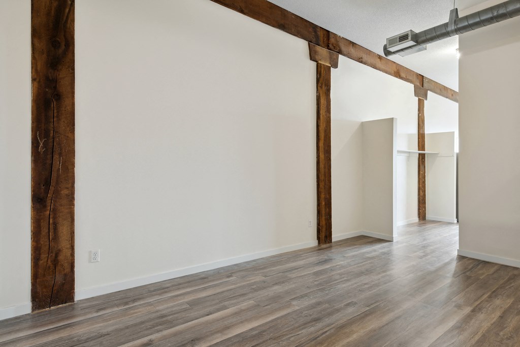 an empty room with white walls and wood floorsat Gaar Scott Historic Lofts, Minneapolis, MN, 55401