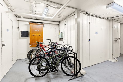 Bike storage room with multiple bicycles at Forestry Court Apartments, Portland, 97210