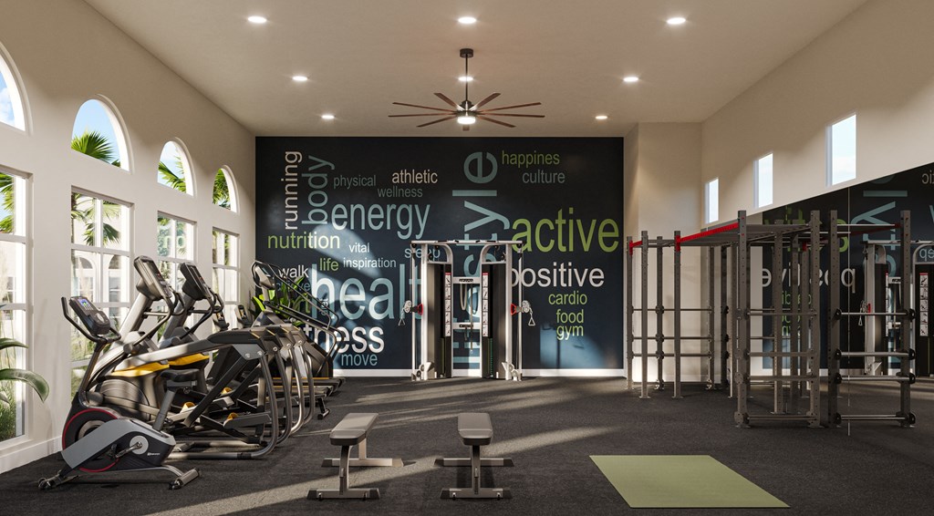 a gym with bikes and a wall with words on it at Arrive Temecula, Temecula, CA