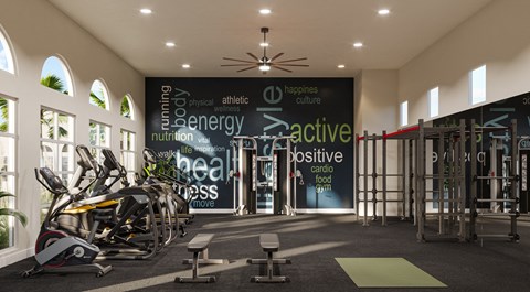 a gym with bikes and a wall with words on it