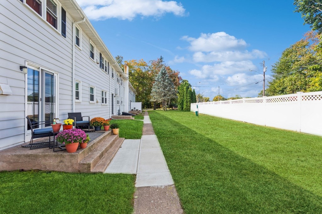 Back side of the apartments with pretty landscape and plants at Fox Hill Commons, Connecticut, 06066