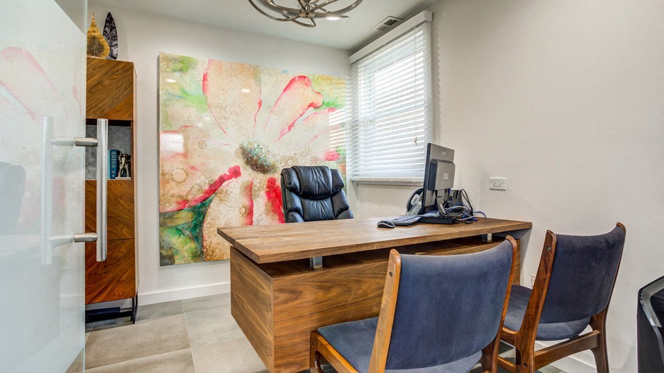 Wooden table and chair at The View Apartments St Charles, Illinois