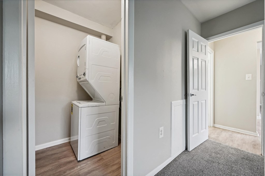 a laundry room with a washer and dryer at ReNew Odenton