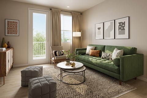 A living room with a green couch, a coffee table, and a rug.