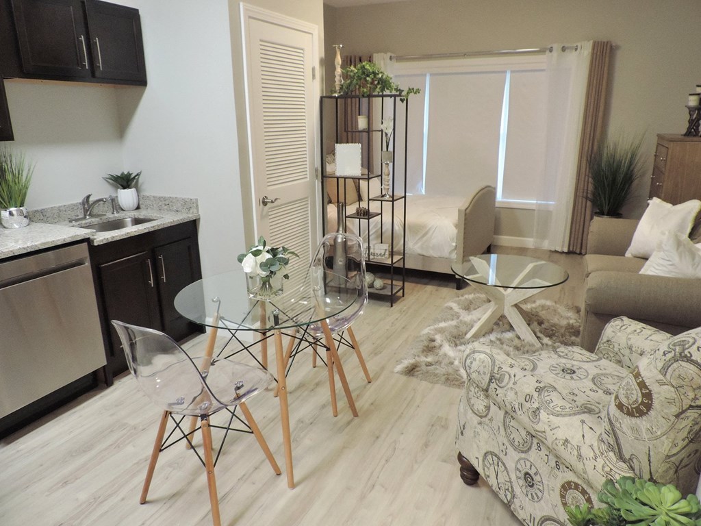 living room with a couch and a table at Lofts at 335, Connecticut