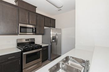 the preserve at ballantyne commons apartment kitchen with stainless steel appliances